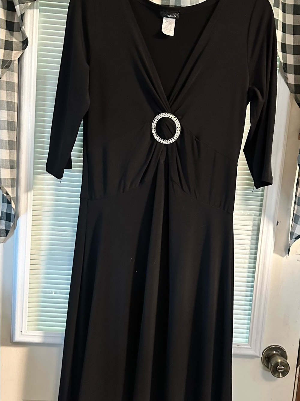 Black Long-Sleeve V-Neck Dress with Decorative Ring